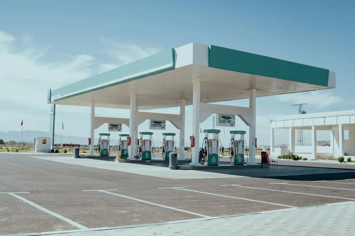 Unbranded fuel station forecourt in daylight