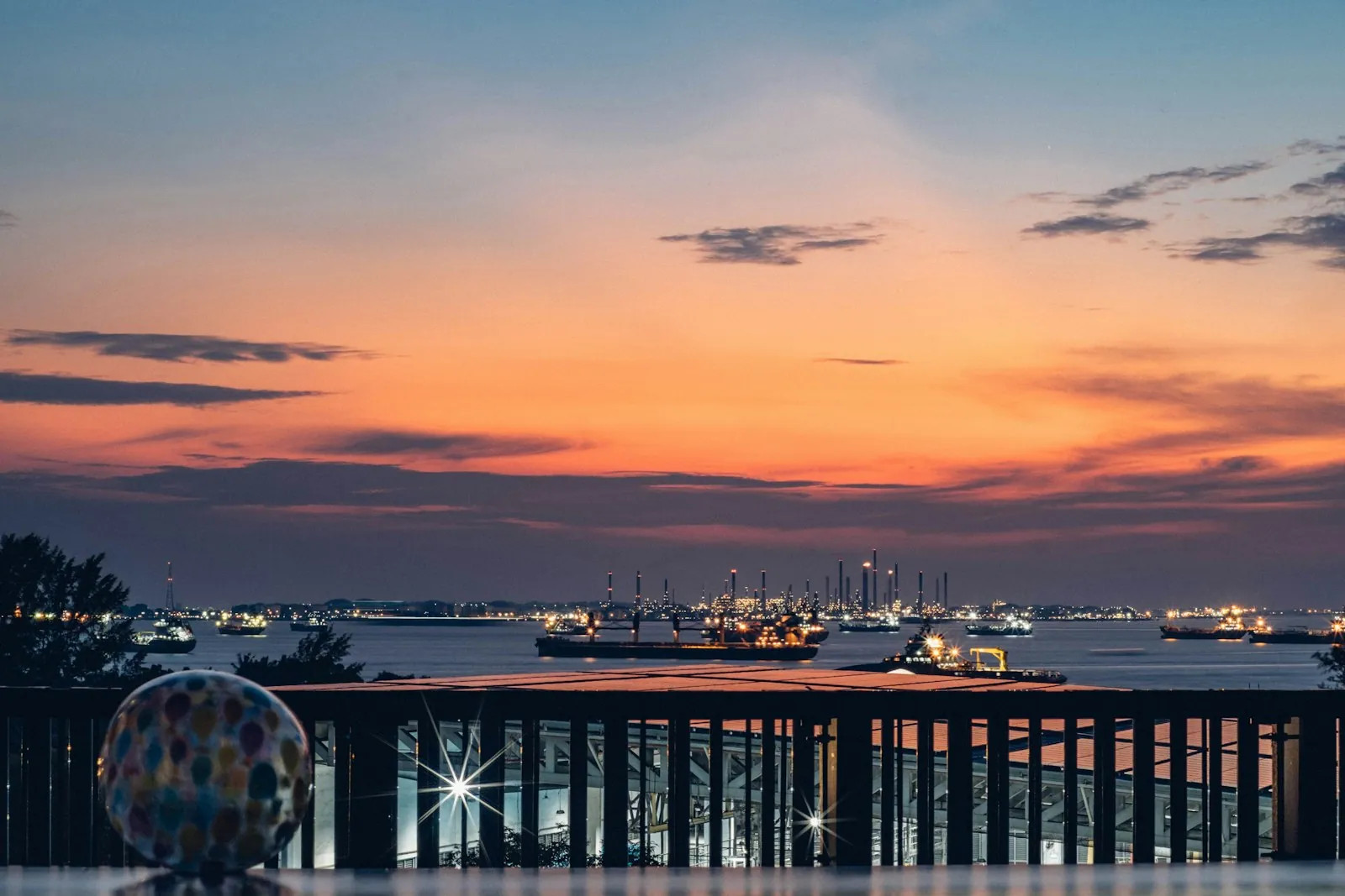 Tankers on the water at sunset